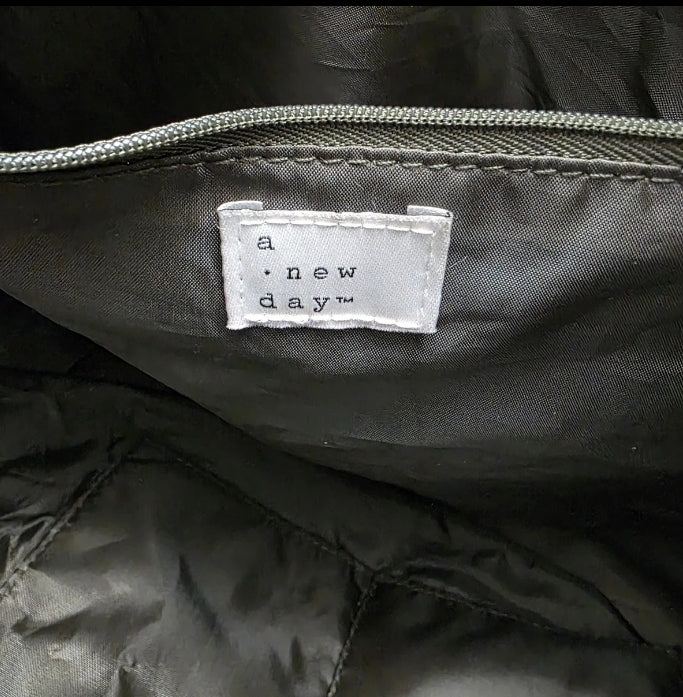 A New Day Green Duffel Bag Tote Zip Closure 15"×26" Inside Pockets. Excellent used condition