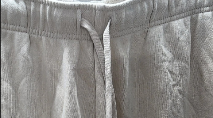 Nike Sweatpants Unisex Size Large Elastic Drawstring Waist Pockets Beige. Excellent used condition