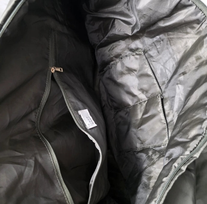 A New Day Green Duffel Bag Tote Zip Closure 15"×26" Inside Pockets. Excellent used condition