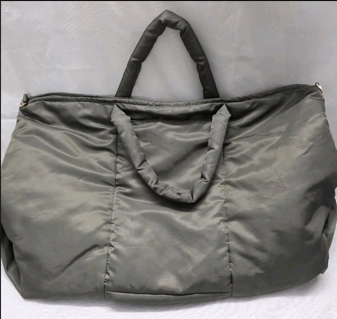 A New Day Green Duffel Bag Tote Zip Closure 15"×26" Inside Pockets. Excellent used condition